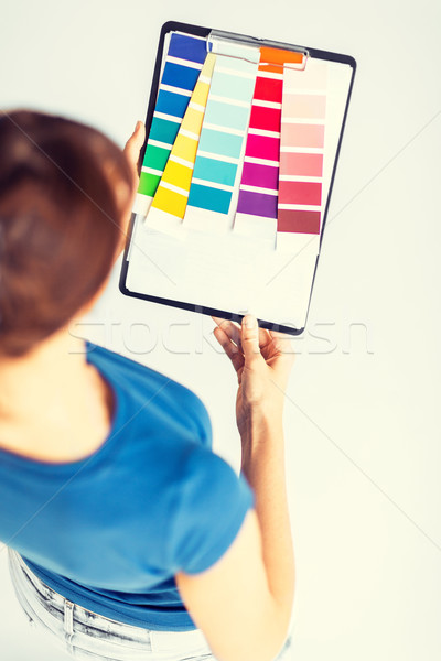 woman working with color samples for selection Stock photo © dolgachov