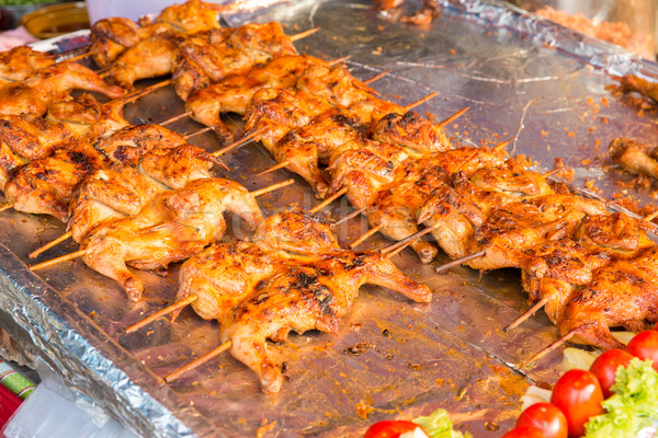 chicken grill at street market Stock photo © dolgachov