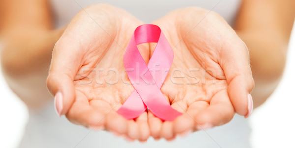 Ręce różowy rak piersi świadomość wstążka Zdjęcia stock © dolgachov