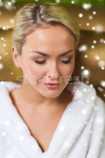 Donna seduta bagno robe spa Foto d'archivio © dolgachov