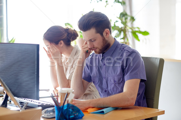 business team with computer and files in office Stock photo © dolgachov