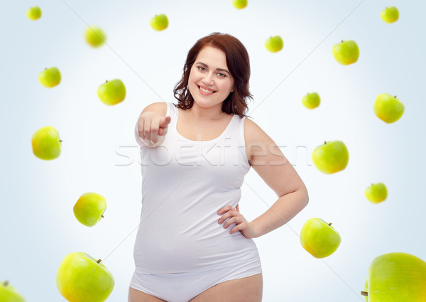 Stock photo: plus size woman in underwear pointing on you