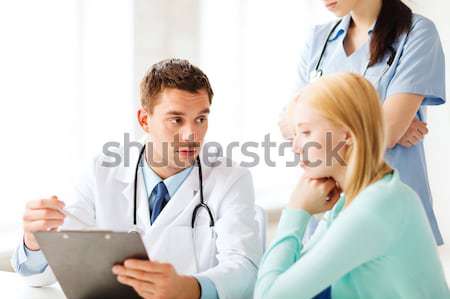 doctor and patient in hospital Stock photo © dolgachov