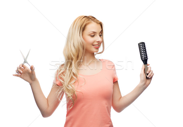 Mulher jovem tesoura escova de cabelo cuidados com os cabelos penteado beleza Foto stock © dolgachov