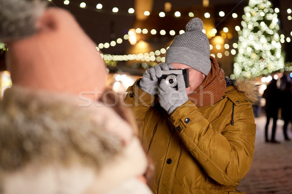 Człowiek kamery kobieta christmas wakacje Zdjęcia stock © dolgachov