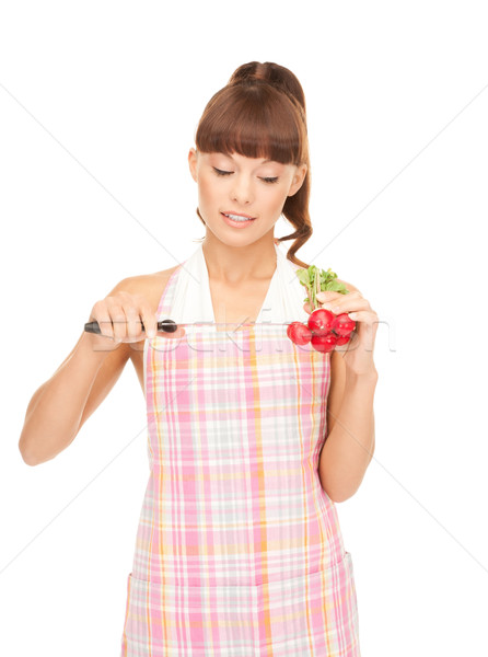 housewife with big knife and radish Stock photo © dolgachov