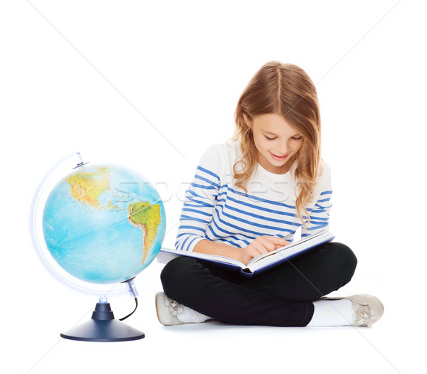 girl with globe and book Stock photo © dolgachov