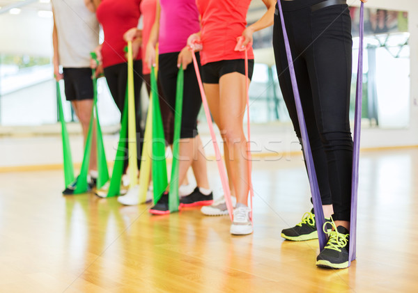 group of people with working out with rubber bands Stock photo © dolgachov