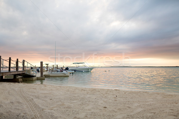 łodzi molo zachód słońca wakacje podróży morza Zdjęcia stock © dolgachov