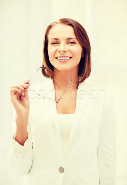 Femeie de afaceri afaceri viziune corectie birou Imagine de stoc © dolgachov