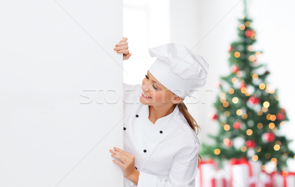 Souriant Homme chef blanche bord cuisson [[stock_photo]] © dolgachov