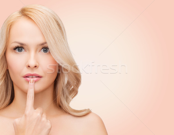 Güzel genç kadın dokunmak dudaklar sağlık insanlar Stok fotoğraf © dolgachov