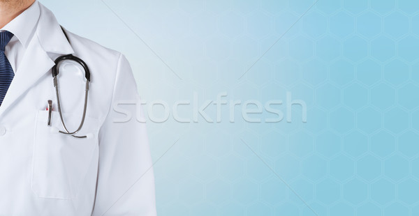 close up of male doctor with stethoscope Stock photo © dolgachov