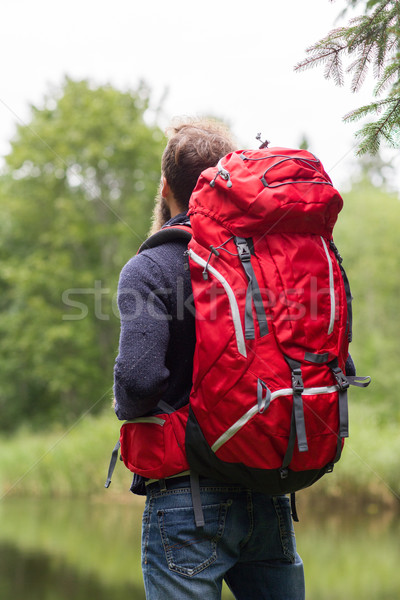 man with red backpack hiking Stock photo © dolgachov