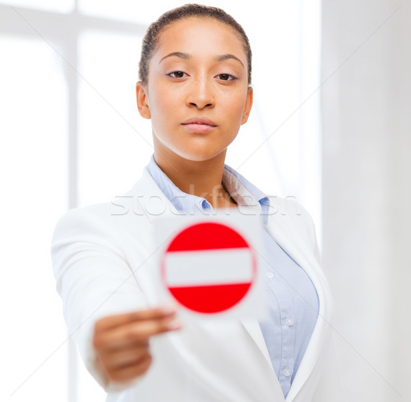 african woman showing stop sign Stock photo © dolgachov