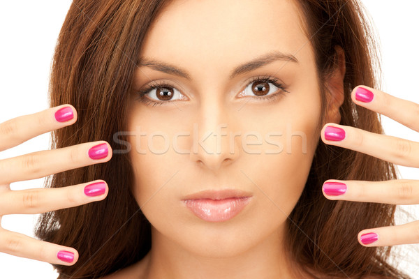 Femme polie clous lumineuses photos blanche Photo stock © dolgachov