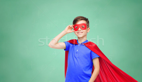 boy in red superhero cape and mask Stock photo © dolgachov