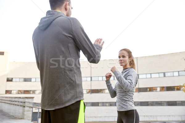Vrouw zelfverdediging staking fitness Stockfoto © dolgachov