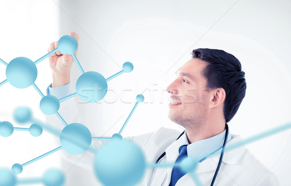 young doctor with molecules Stock photo © dolgachov