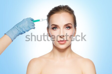 Frau Gesicht Hand Spritze Injektion Menschen Stock foto © dolgachov