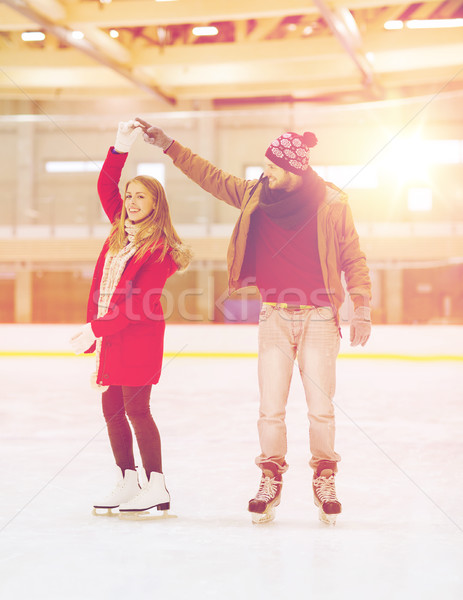 Heureux couple mains tenant patinage personnes [[stock_photo]] © dolgachov