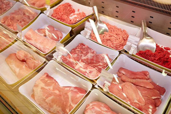 Stock photo: meat in bowls at grocery stall
