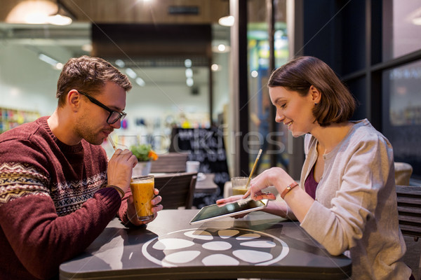 Heureux couple smoothie café personnes [[stock_photo]] © dolgachov