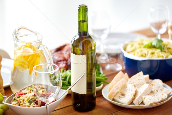 Bouteille vin alimentaire servi table en bois alcool [[stock_photo]] © dolgachov