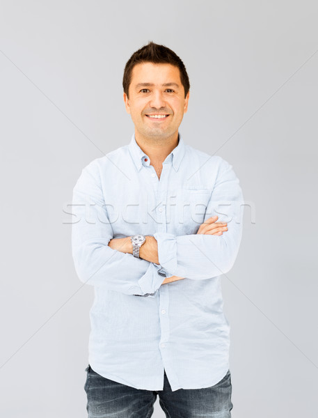 Knap glimlachend man portret toevallig shirt Stockfoto © dolgachov