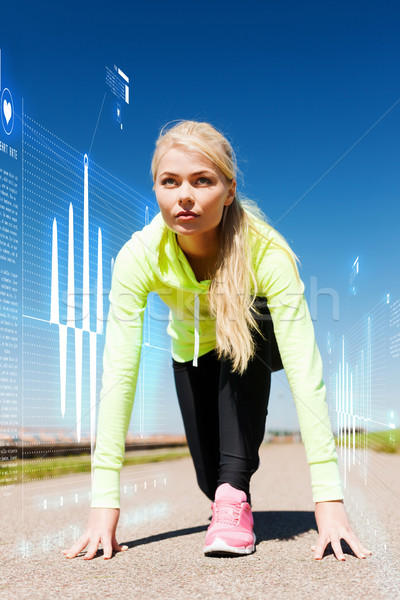 concentrated woman doing running outdoors Stock photo © dolgachov