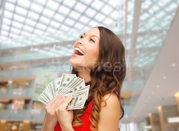 woman in red dress with us dollar money Stock photo © dolgachov