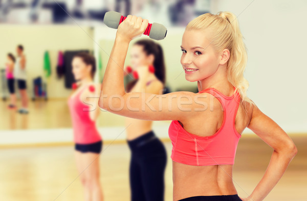 Tineri femeie lumina fitness Imagine de stoc © dolgachov