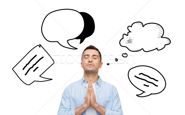 Stock photo: man praying to god with text bubble doodles