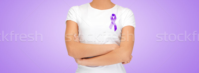 close up of woman with purple awareness ribbon Stock photo © dolgachov