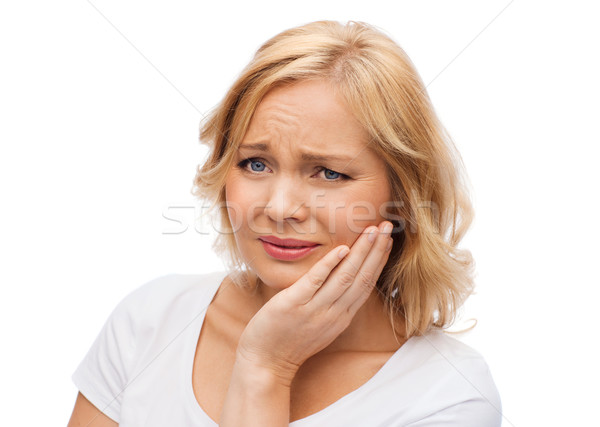 Boldogtalan nő szenvedés fogfájás emberek egészségügy Stock fotó © dolgachov