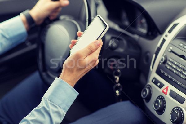 человека стороны смартфон вождения автомобилей Сток-фото © dolgachov