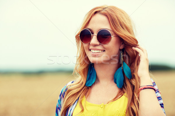 smiling young redhead hippie woman outdoors Stock photo © dolgachov