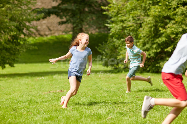 Four Glad Kids Happily Playing Running Stock Photo 740951944