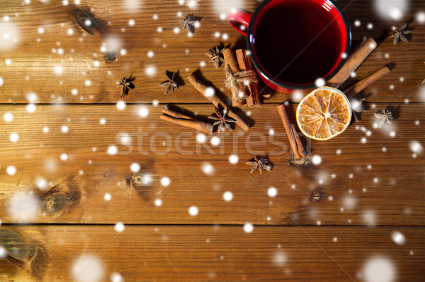 tea cup with winter spices on wooden table Stock photo © dolgachov