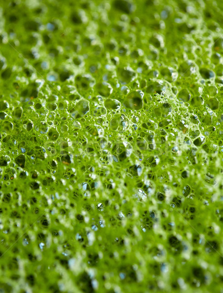 close up of matcha green tea latte foam bubbles Stock photo © dolgachov