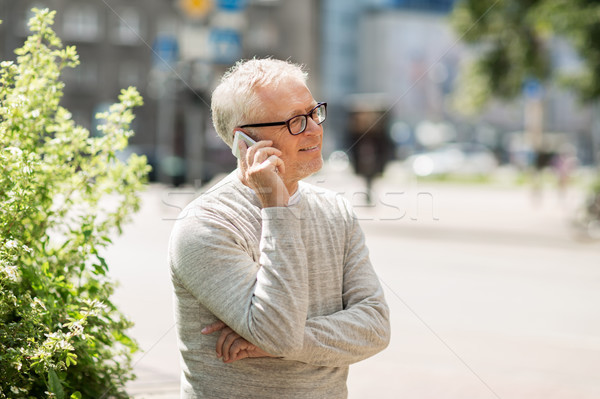 Heureux supérieurs homme appelant smartphone ville [[stock_photo]] © dolgachov
