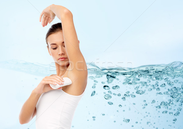 Stock fotó: Nő · dezodor · kék · higiénia · testápoló · emberek