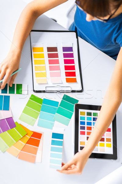 woman working with color samples for selection Stock photo © dolgachov