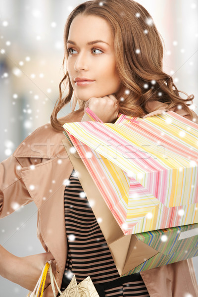 Stock photo: woman with shopping bags in ctiy