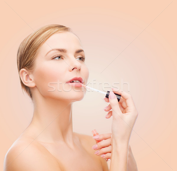 Piękna kobieta kosmetyki zdrowia piękna różowy twarz Zdjęcia stock © dolgachov