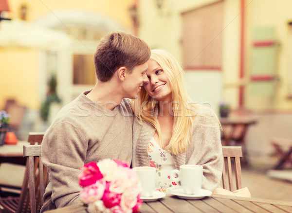 Romantikus boldog pár csók kávézó nyár Stock fotó © dolgachov
