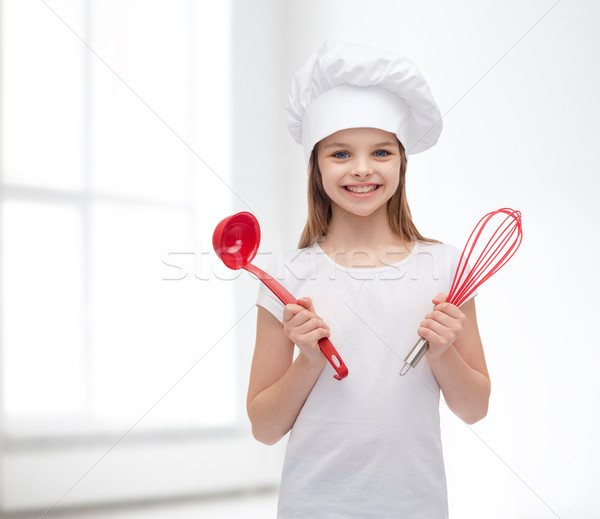 Sorridere ragazza cuoco Hat mestolo Foto d'archivio © dolgachov