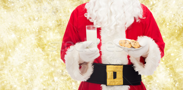 Babbo natale vetro latte cookies Natale vacanze Foto d'archivio © dolgachov