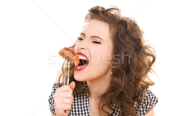 paleo diet concept - woman eating meat Stock photo © dolgachov