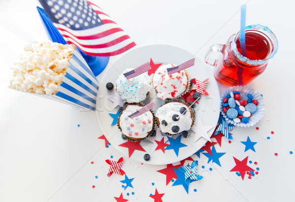 cupcakes with american flags on independence day Stock photo © dolgachov